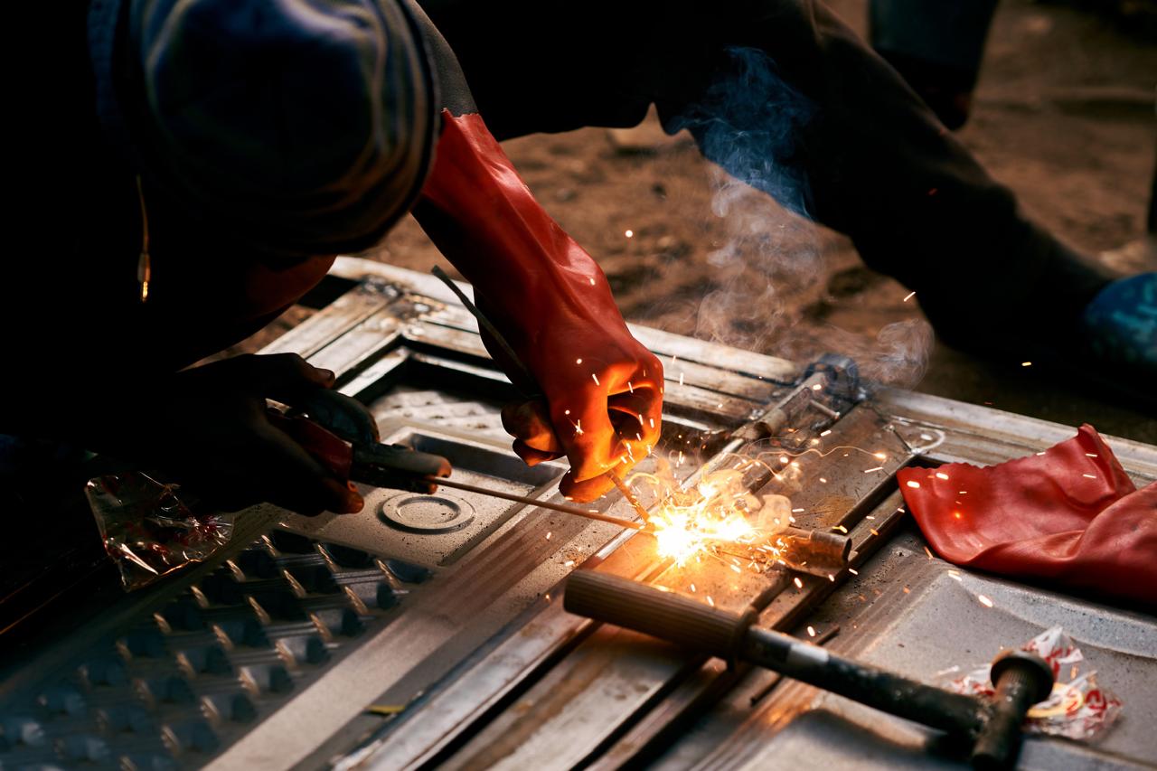 A young person receiving practical welding skills training